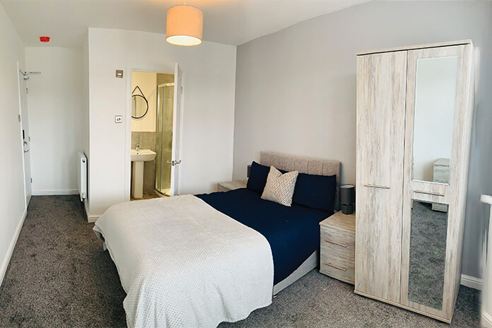 A bedroom in a HMO Property