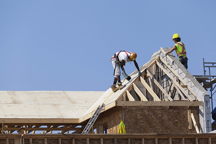 Workmen working on a rooftop